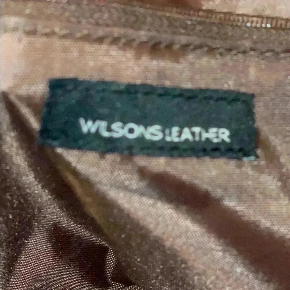 Wilson leather original back, rown color great conditions with adjstbel strap